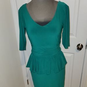 Just Taylor Peplum dress size 6
Stretchy material